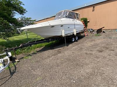 BOATZON | Larson Cabrio 254 Mid Cabin 2001