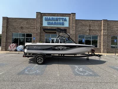 BOATZON | Nautique Super Air 210 wExcalibur PCM 330HP Engine and Boatmate Trailer Included 2003