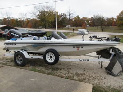 BOATZON | TRACKER NX750  2016 EVINRUDE 115 HP OUTBOARD AND TRAILER 2005
