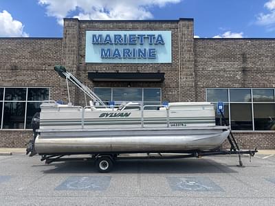 BOATZON | 1999 Sylvan Elite 820 wNew Tohatsu Engine and Single Axle Trailer Included