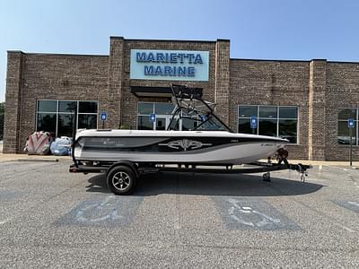 BOATZON | 2003 Nautique Super Air 210 wExcalibur PCM 330HP Engine and Boatmate Trailer Included