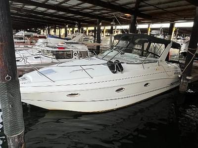 BOATZON | Larson Cabrio 330 Mid Cabin 1999