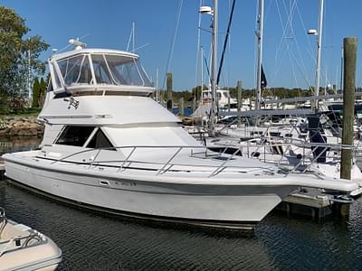 BOATZON | 1997 Phoenix 38 SFX Convertible