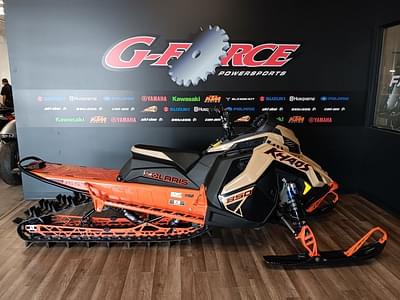 BOATZON | Polaris® 850 RMK Khaos 155 Gloss BlackMilitary TanOrange Burst 2024