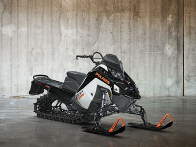 BOATZON | Polaris® 650 RMK SP 155 White Lightning Gloss Black Orange Burst 2027 BOATZON | Polaris® 650 RMK SP 155 White Lightning Gloss Black Orange Burst 2027