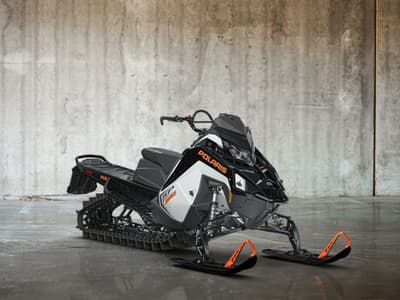 BOATZON | Polaris® 850 RMK SP 155 White Lightning  Gloss Black  Orange Burst 2027